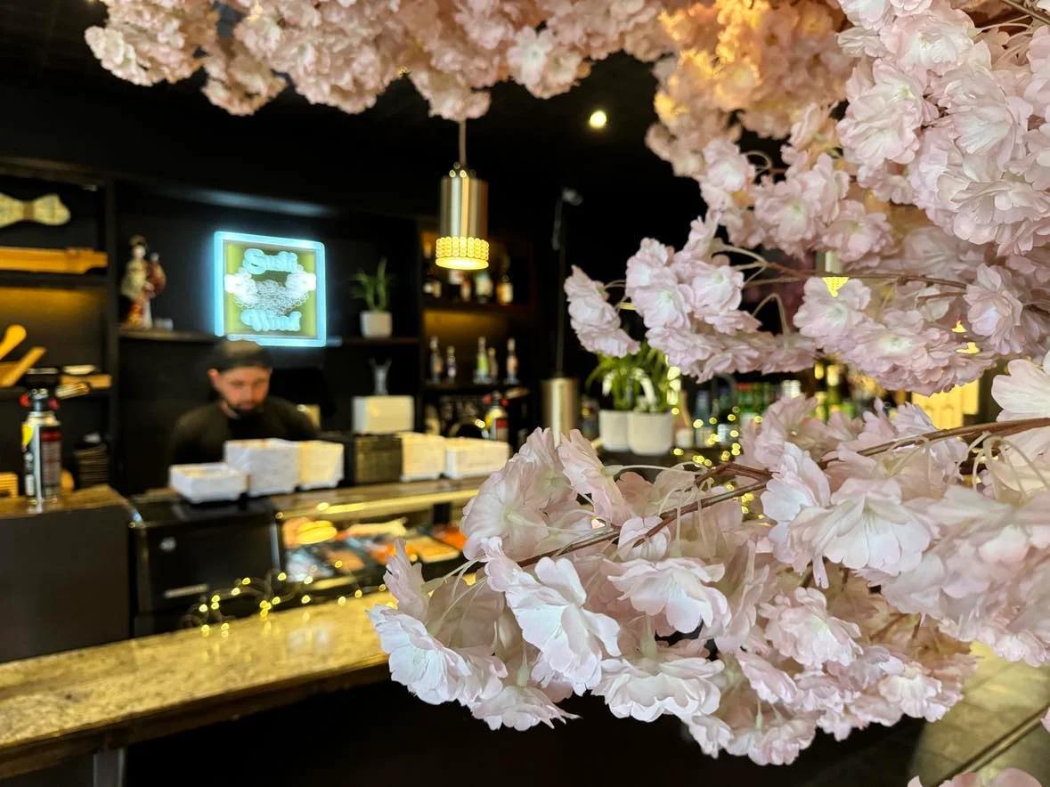 sushi till area covered with flowers